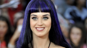 In June 2012, there was still some purple in her hair, but this time only the high lights. 