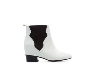 This pair of low boots is from Zara and they cost €79.95. They're very pretty, but white shoes get dirty so fast... :s 